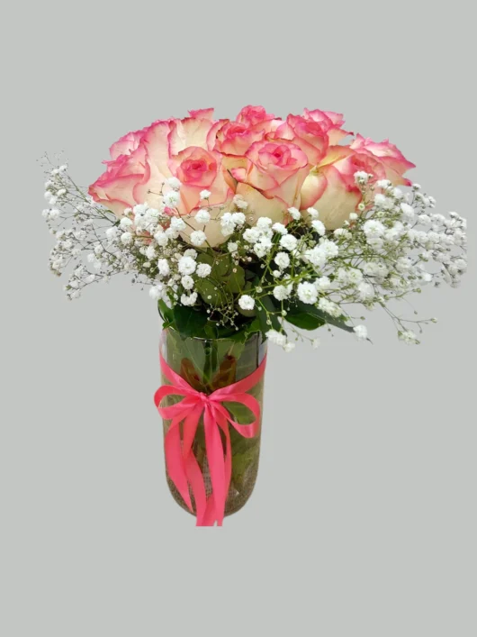 Pink Whisper cream roses in glass vase by RosaBella Flowers