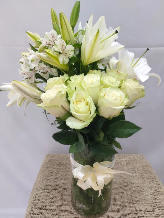 White Grace white lilies in glass vase by RosaBella Flowers