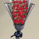 Crimson Prestige cascading red roses bouquet by RosaBella Flowers