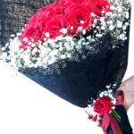 Ruby Cascade red roses and baby's breath by RosaBella Flowers